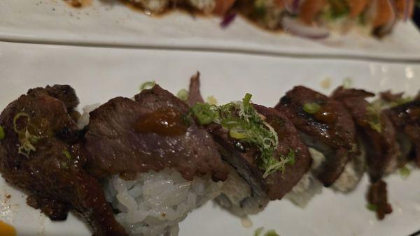 Cowboy Roll - Prime NY steak, crab meat,  avocado, cucumber,  green onion