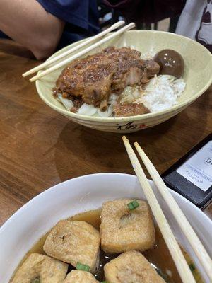 Pork chops rice and small plate of tofu