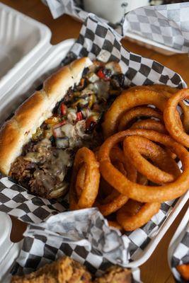 Philly Cheesesteak & Onion Rings - IG: @nelson_eats