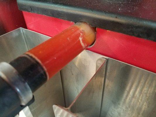 Weird white stuff in ketchup tube. Disgusting!