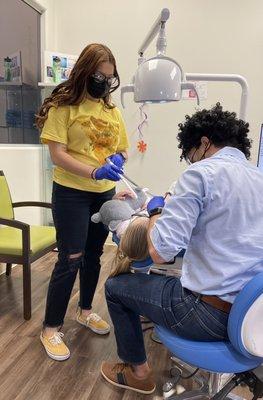 Dr. Issa removing the tops braces and expander.