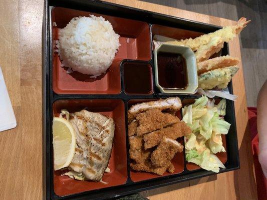 Lunch bento box with ton katsu, mackerel and tempura