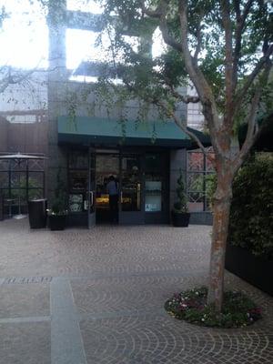 view of caffe with green awning