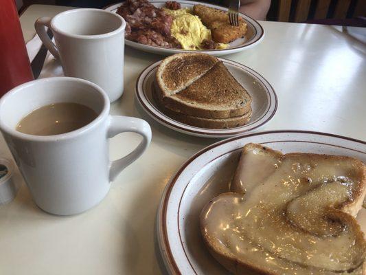 My friend's corned beef hash breakfast is in the background.