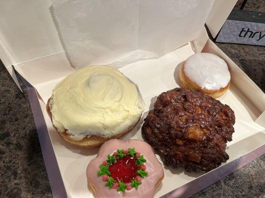 Apple fritter, cinnamon roll, filled donuts.