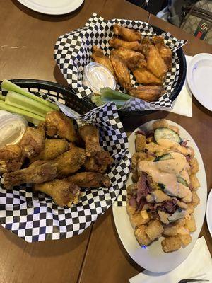 Lemon pepper and buffalo wings with Pastrami Tots!