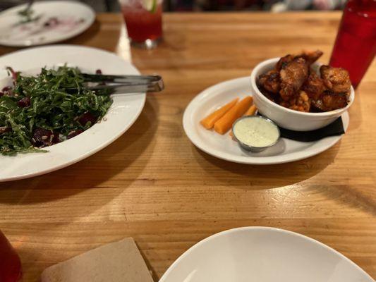 Arugula and beet salad and smoked wings