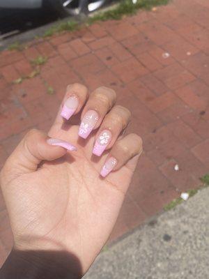 I asked for pink French tips and Hibiscus flowers and for exactly that. Love my new nails!!