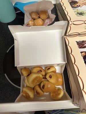 A dozen kolaches and a dozen glazed donut holes