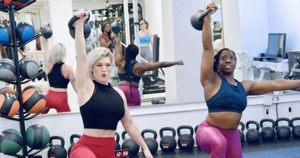 Anna and Saneeta kettlebell training