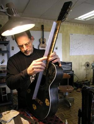 Ralph Luttrell, Luttrell Guitar Repair of Atlanta, working on a Gambler