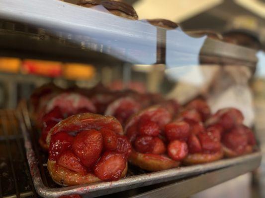 Fresh Strawberry Donuts on display