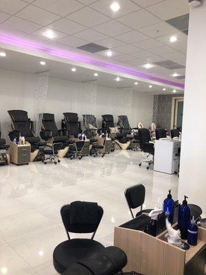 Nice pretty salon! Have some princess chairs in the back for little girl nail treatment.