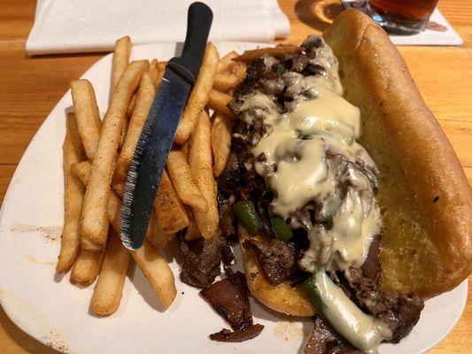 Philly Cheesesteak with seasoned fries.  A little salty but not bad.