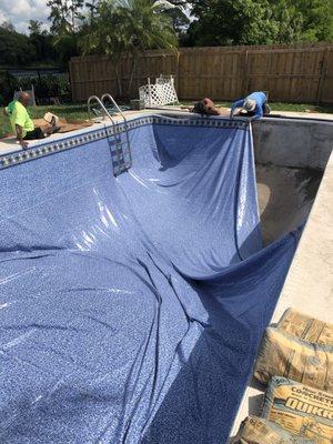 Bags of unused concrete on pool deck!