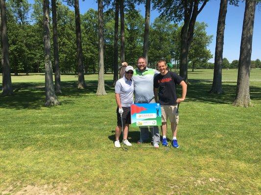 Employee golf outing and community event.