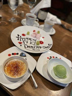 Crème brûlée, green tea ice cream with strawberry mochi for our anniversary dessert.