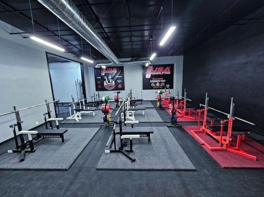 9 Combo Racks for Squatting and Benching. Calibrated weights. Powerlifting Heaven!