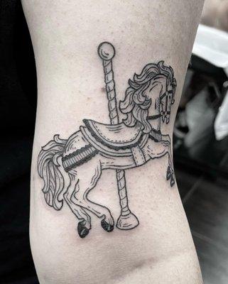 Merry go round by Cari @carebeartattoos at Wolf & Shadow Tattoo Collective