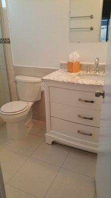 The finished product of a bath remodel in Paramount, CA. By: Appease Builders Co.