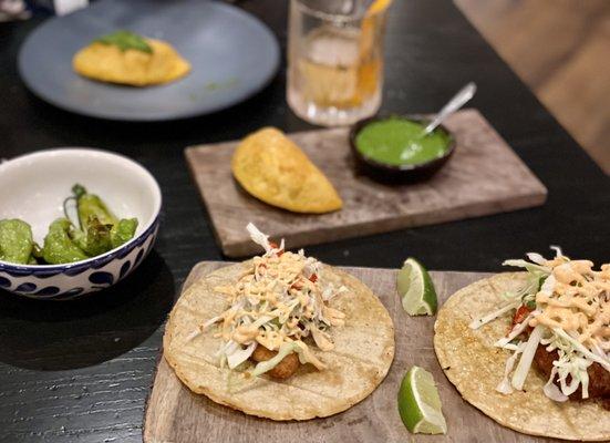 pescado tacos and short rib empanadas