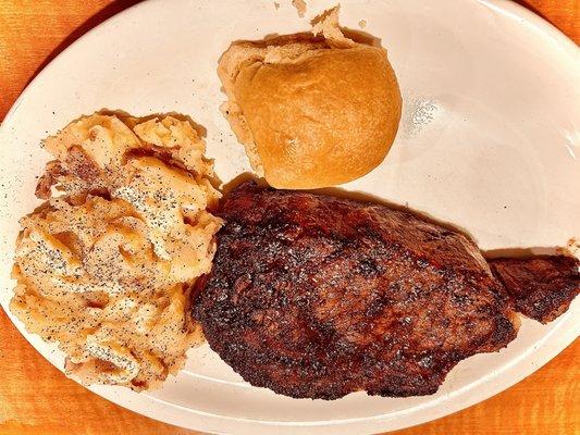 I got the 14OZ Ribeye with the red potato mashers and a roll.