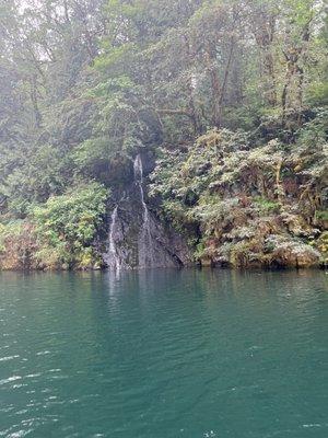 Larger waterfall emptying into lake