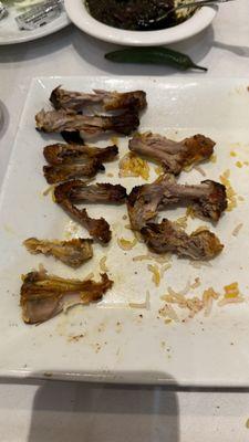 These are the bones of the dish. Easy way to tell if this was a full Cornish Hen. Which it is not.