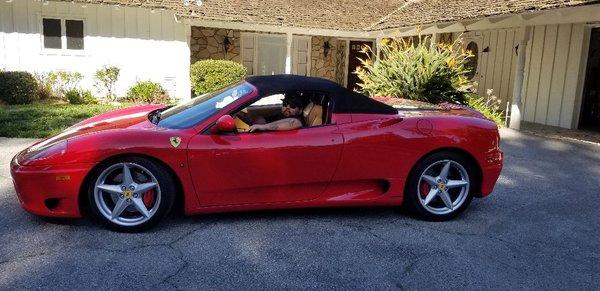 Red Ferrari Spider after a long detail.