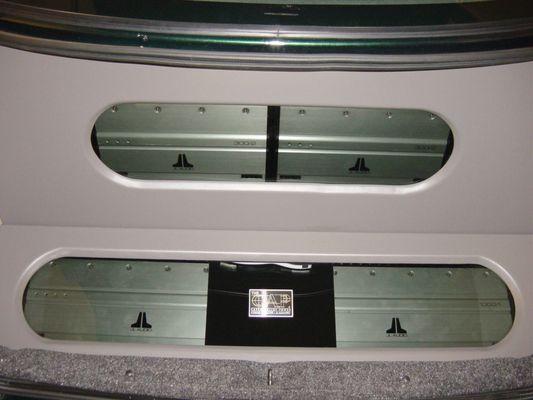 Amp racks built to maintain trunk space.