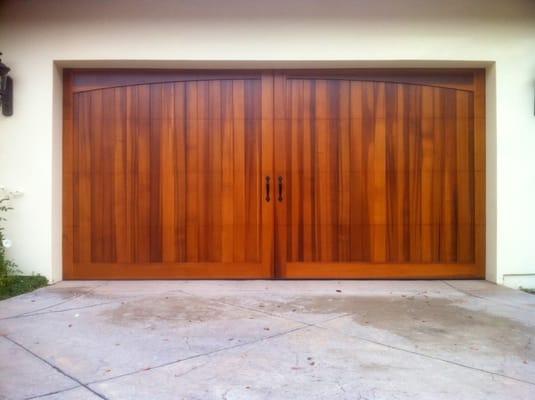 Custom wood door installed by Conejo Genie Door. We specialize in high grade, cost effective metal and wood garage doors.