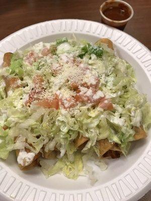 Flautas $7. The red sauce is perfectly balanced spicy and smokey.