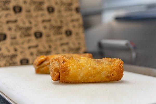 NO CAP EGGROLLS
Two crispy deep fried egg rolls filled with Impossible™ burger, cheddar cheese, onions, and peppers.