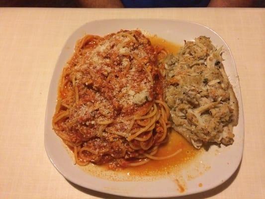 Spaghetti with meat sauce and flounder stuffed with crab