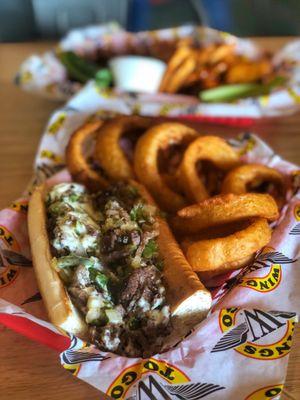 Cheese steak, onion rings, and boneless wings(in the back). Yummy