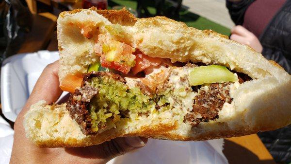 Interior of falafel sandwich w/Turkish bread ($10), vegan by default. Bread was tasty but overwhelming. Falafel was middling.