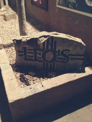 Stone sign outside Leo's.