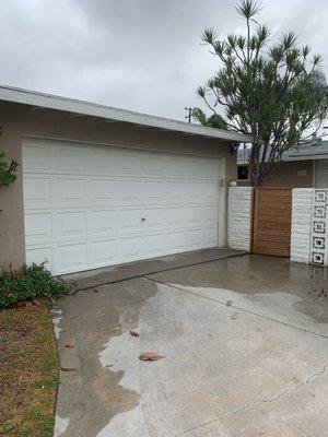 Before- my 25 year + garage door... noisier than heck.