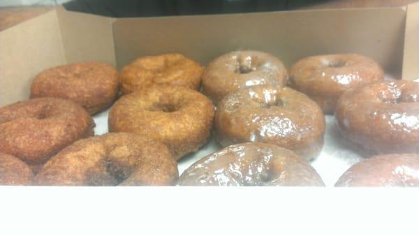 Fresh pumpkin donuts (plain and glazed) fresh from the fryer...so good.