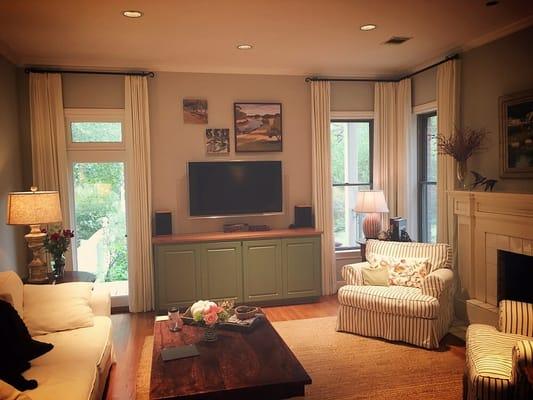 Custom ivory linen drapery helped update the family room for this wonderful couple.