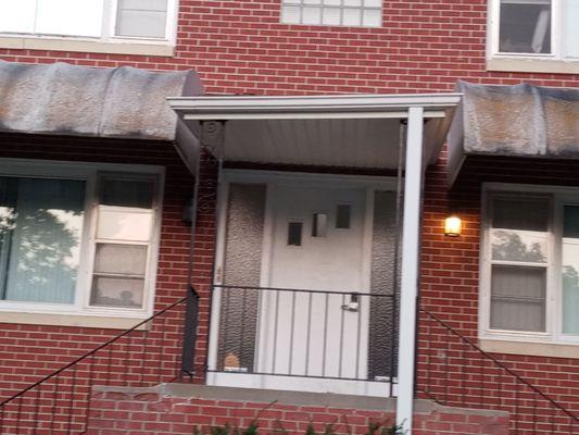 Crooked Porch and nasty looking awnings!!