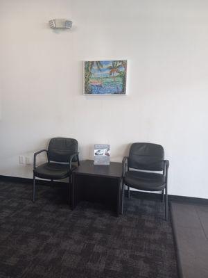 Half of the seated waiting area