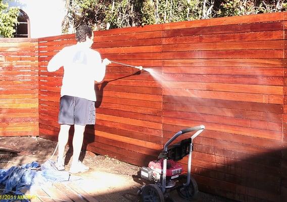 Ipe hardwood fence, pressure washed then stained (horizontal style