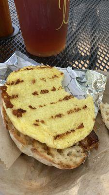 Thin dried-up egg patty and one strip of bacon on a bland Thomas English muffin. Couldn't find the cheese.