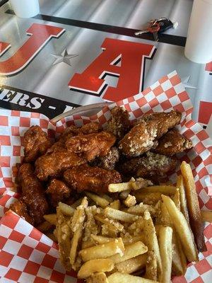 buffalo wings and garlic parm wings served with Garlic Fries