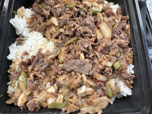 #23. Large Bulgogi Bowl. Delicious ribeye beef with onions, green peppers, and mushrooms over steamed rice.