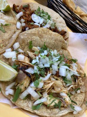 Chicken and Al Pastor tacos.