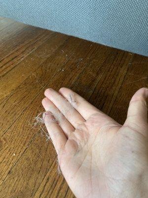 I wiped my hand under the chair after a floor cleaning. Sweeping under these chairs is not part of the "standard cleaning".