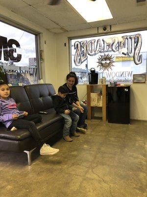 Shop's waiting area. Not pictured was the big flatscreen tv on the wall across from the couch.