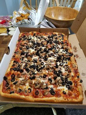 12 cut square sausage mushroom and black olives. Best pizza in Amsterdam N.Y.